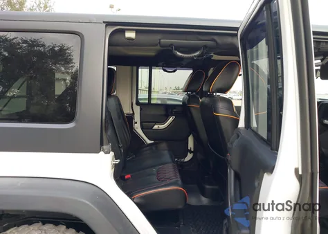 2011 Jeep Wrangler Unlimited Rubicon из США, поврежденный, VIN 1J4BA6H10BL536027